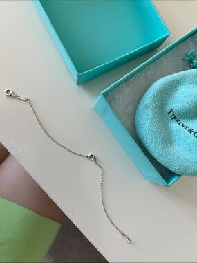 Tiffany & Co. Silver Bracelet with Blue Accent